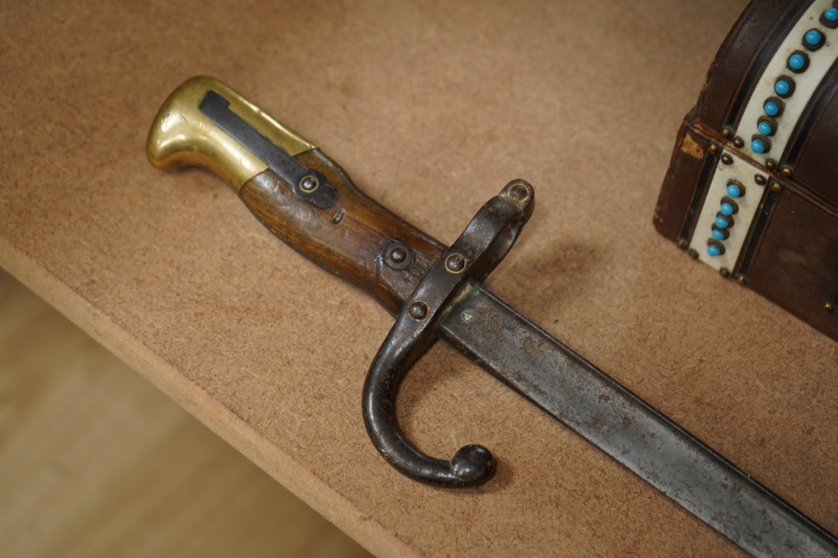 A 19th century brass mounted bayonet together with a tea caddy and a domed casket (a.f)